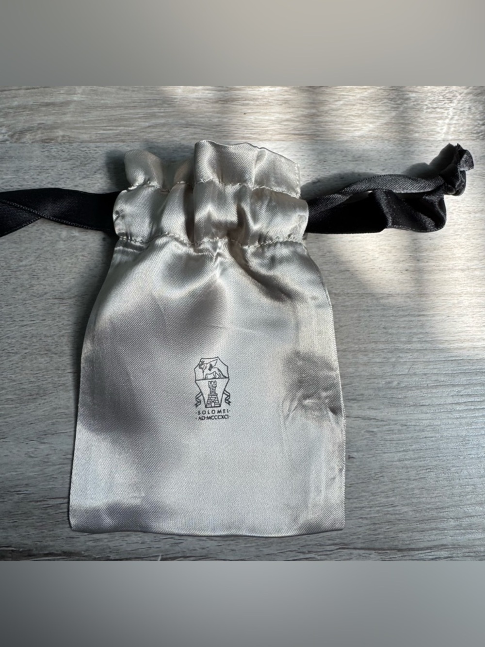 Brunello Cucinelli-a small pouch from the Italian luxury brand Brunello Cucinell